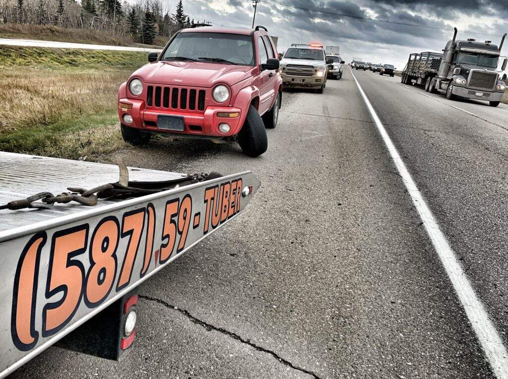 Broken down jeep on yellowhead that needs a tow truck